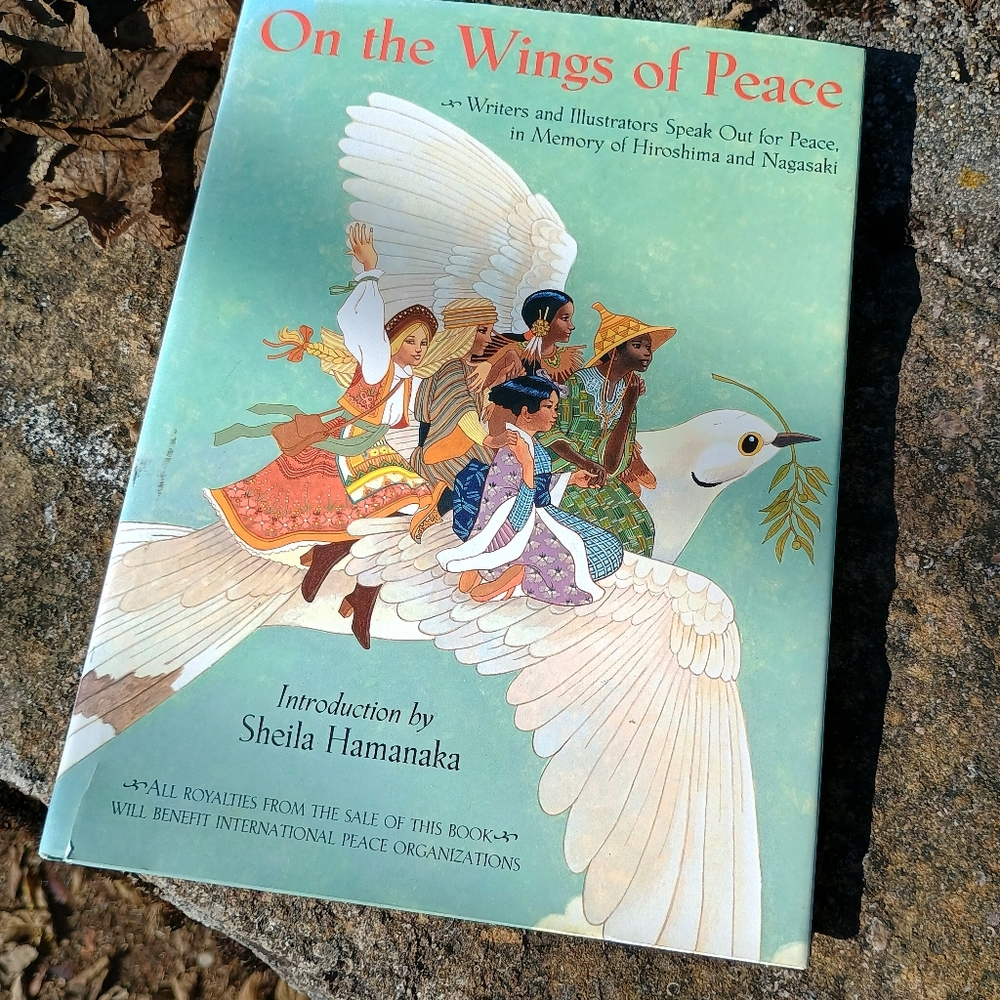 1995 copy of "On the Wings of Peace," 50th anniversary memoir of wwll bombings